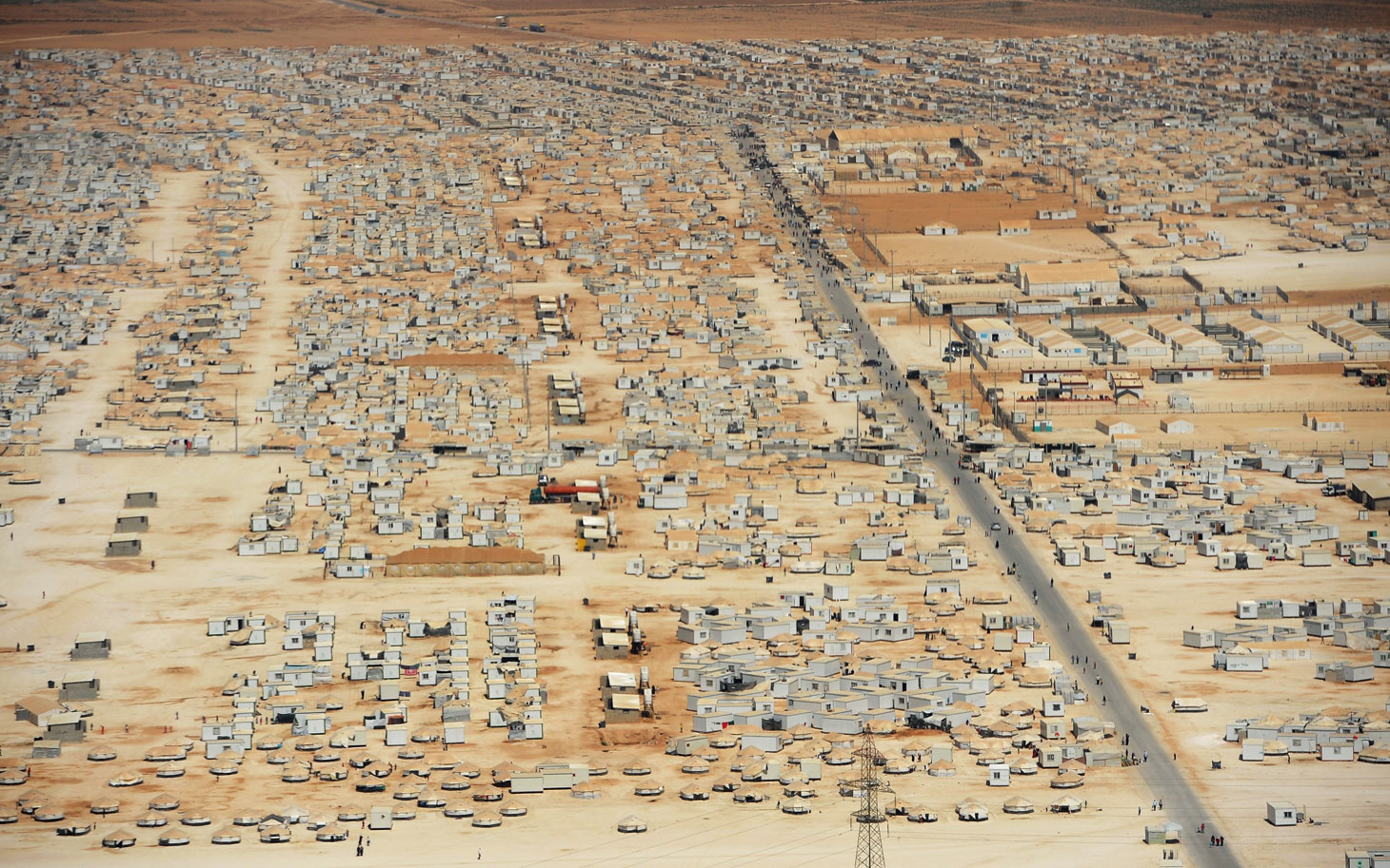 An aerial view shows the Zaatari refugee camp on July 18, 2013 near the Jordanian-Syrian border. The northern Jordanian Zaatari refugee camp is home to 115,000 Syrians.